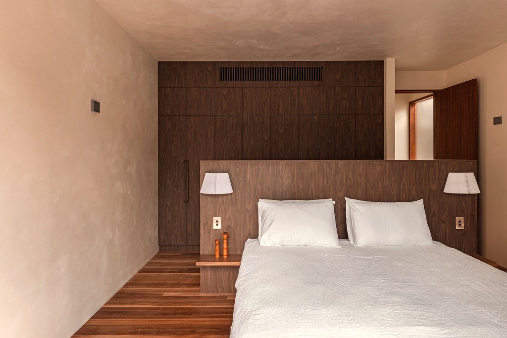 Master, walnut headboard wall