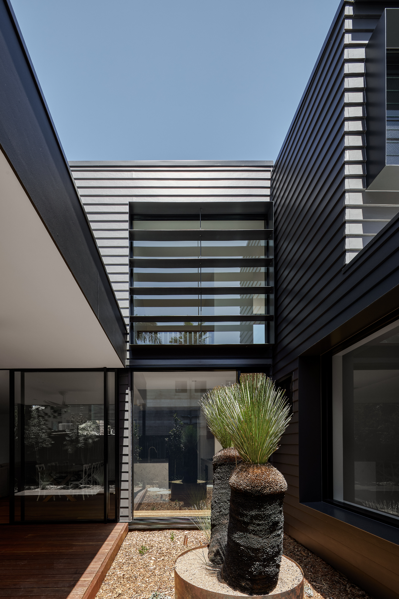 Courtyard planting and upper bridge