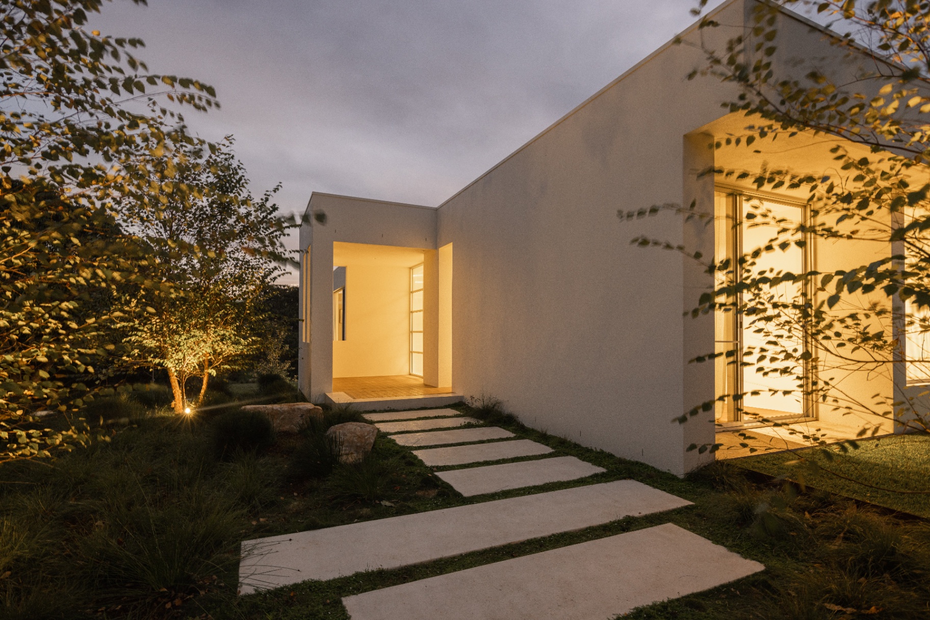 Garden path, entry court — dusk