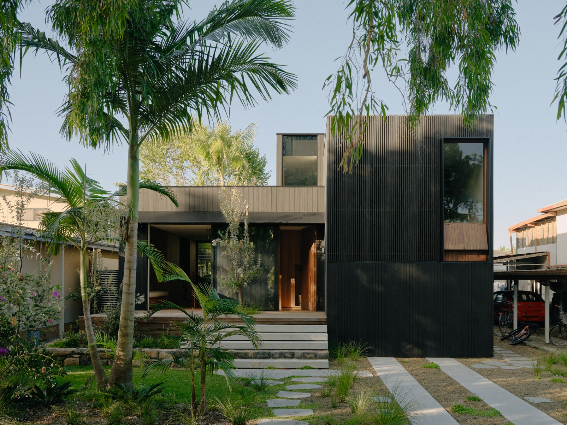 Front facade through the palms