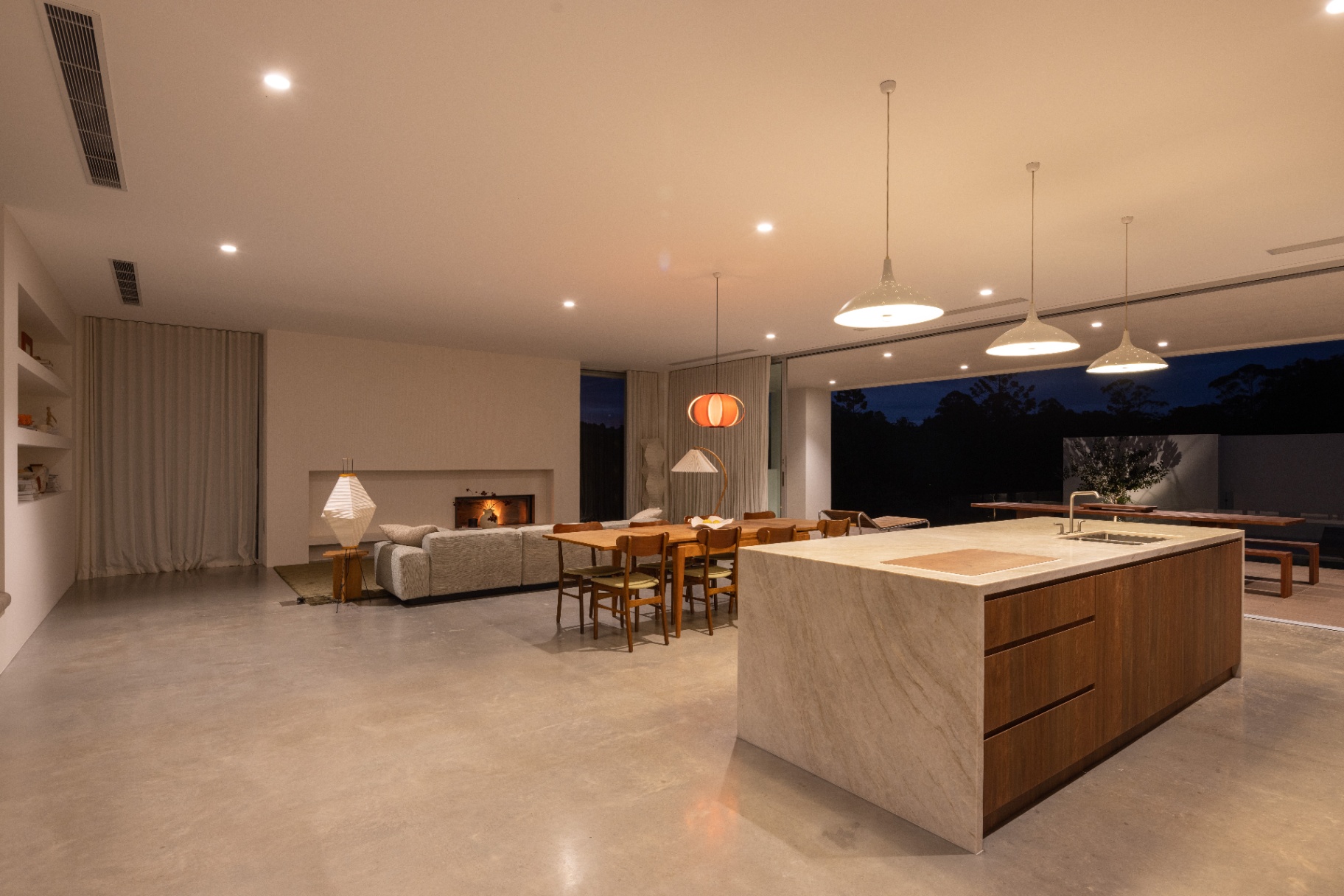 Kitchen, dining and living — night