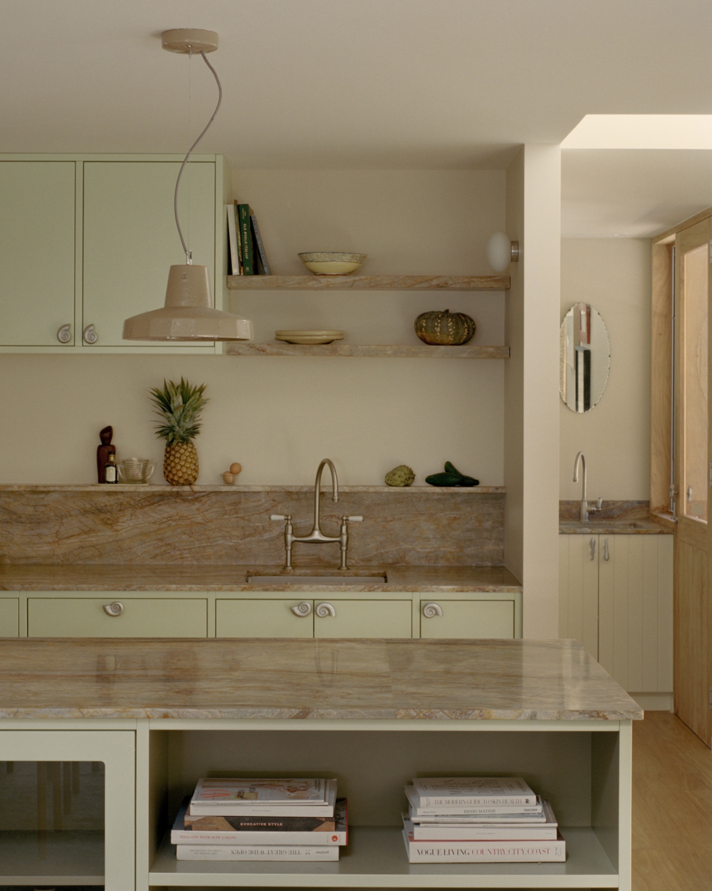 Galley sink, stone shelves