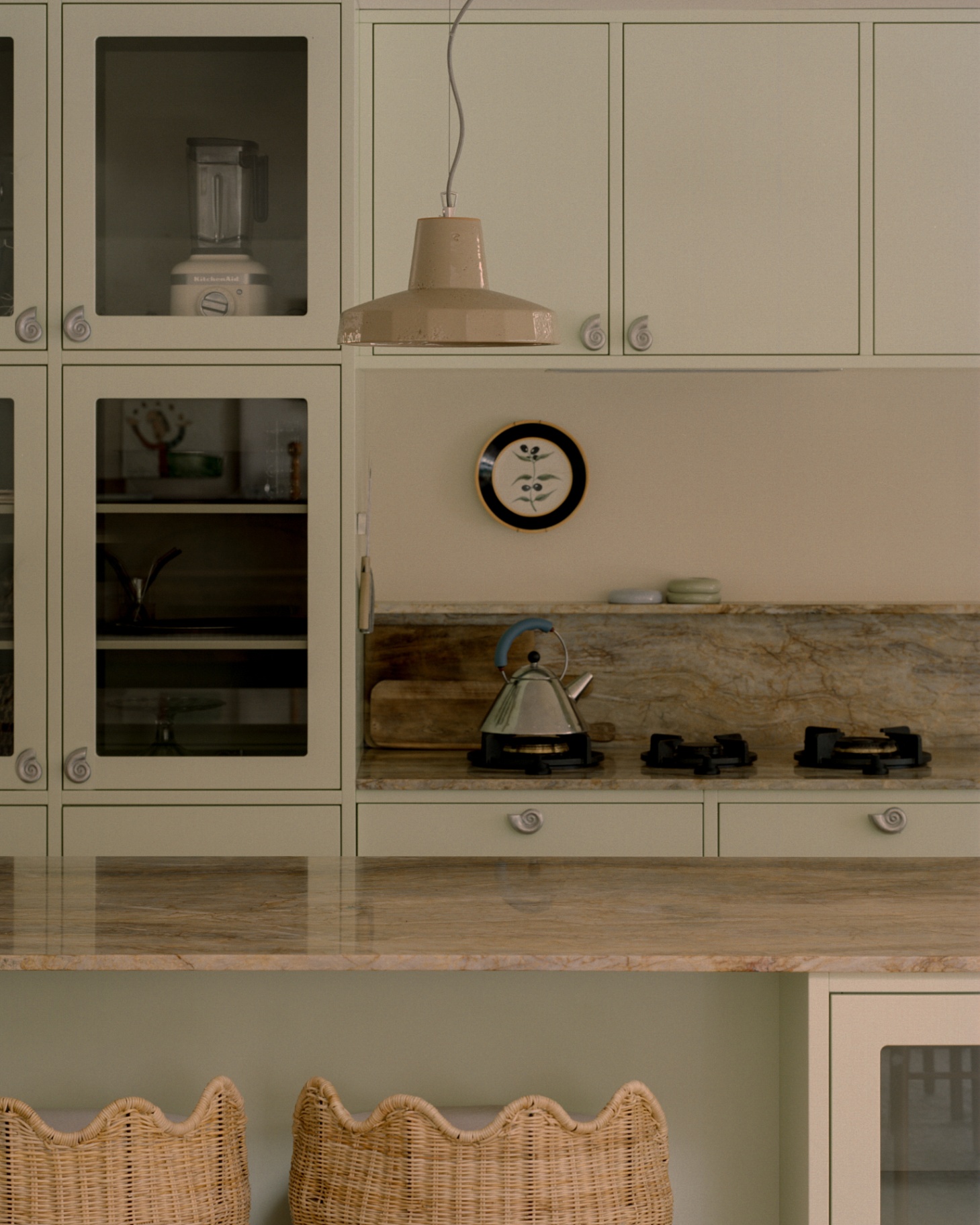 Qariza stone splashback, sage joinery