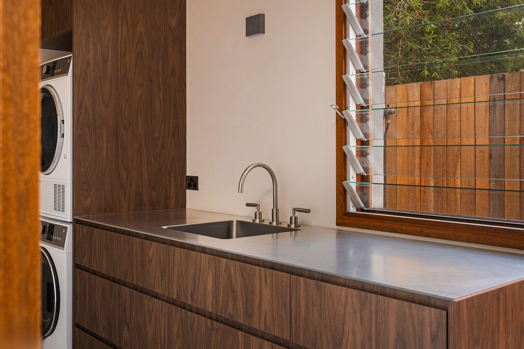 Laundry, walnut joinery and louvre window