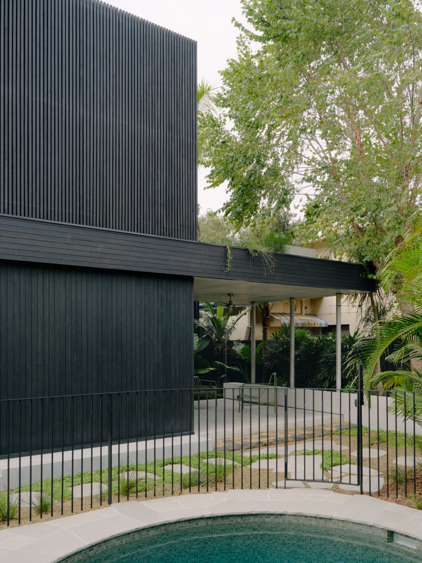 Pool, facade and stepping stones
